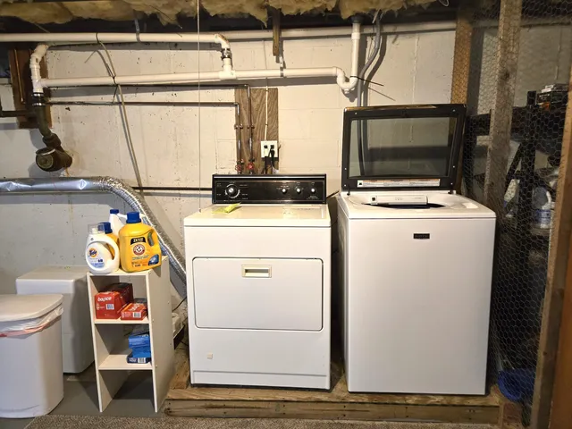 a utility room with dryer and washer