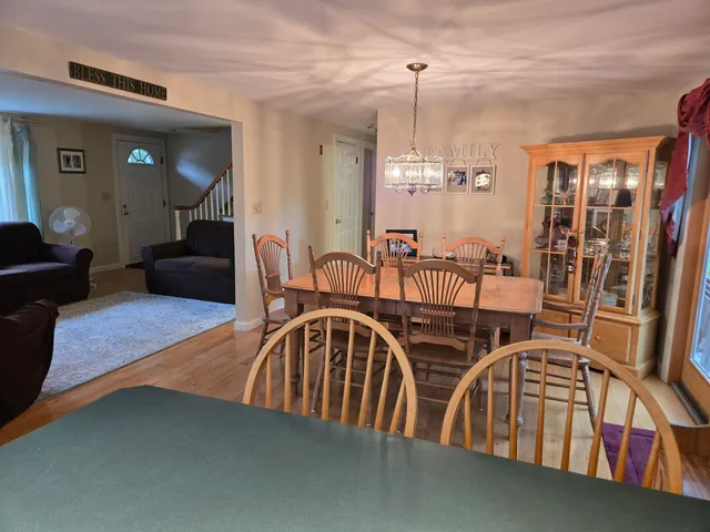 a view of a livingroom with furniture and window