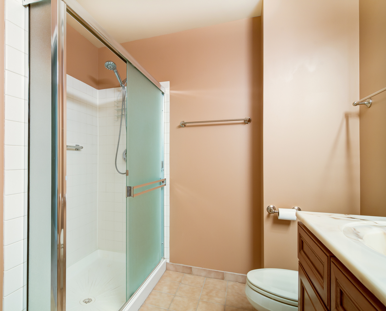 6000 North Cicero Avenue, Unit 511 Chicago, IL 60646 - Photo 12 of 19 a bathroom with a granite countertop shower toilet and sink