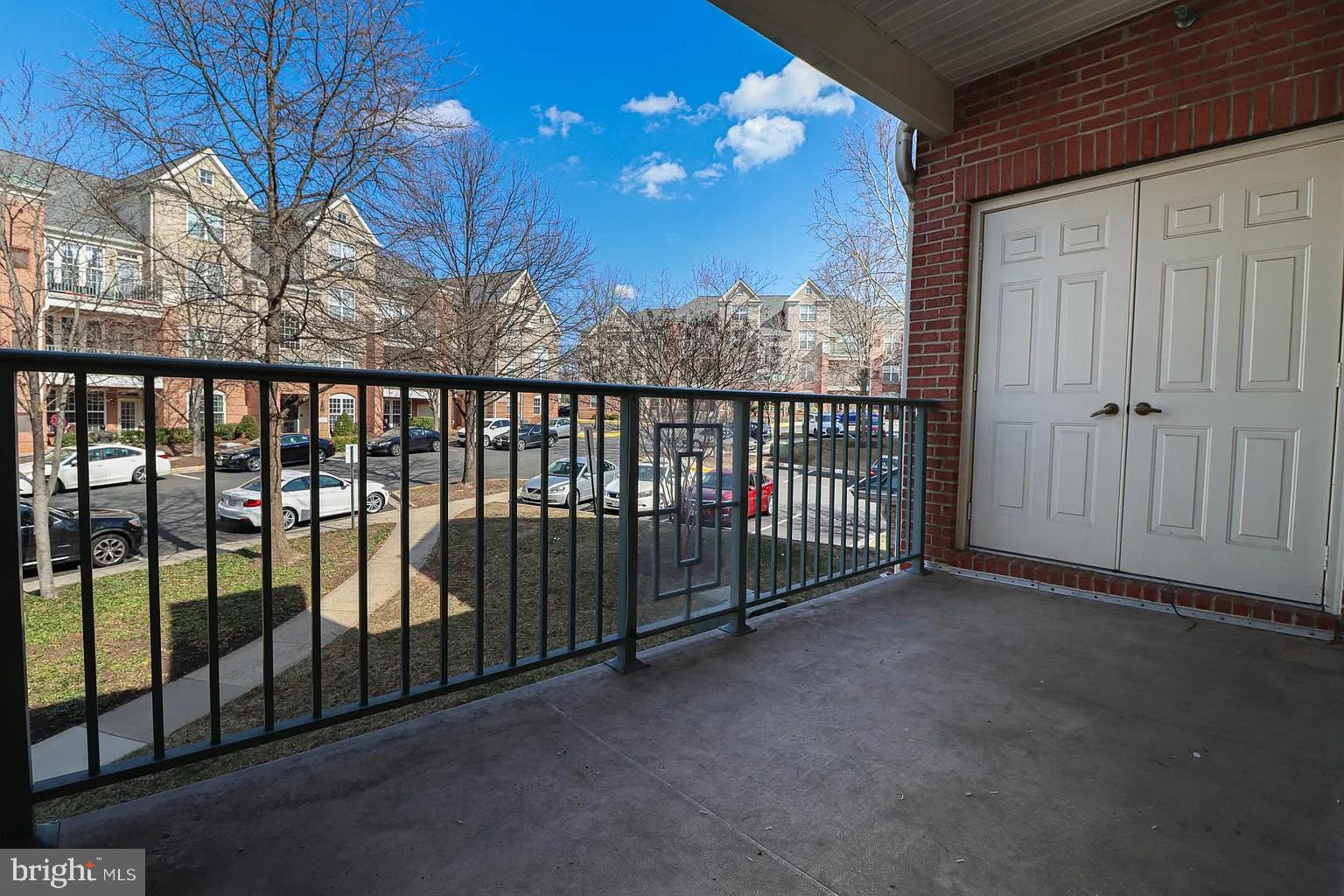 12185 Abington Hall Place, Unit 201 Reston, VA 20190 - Photo 21 of 32 a view of a balcony