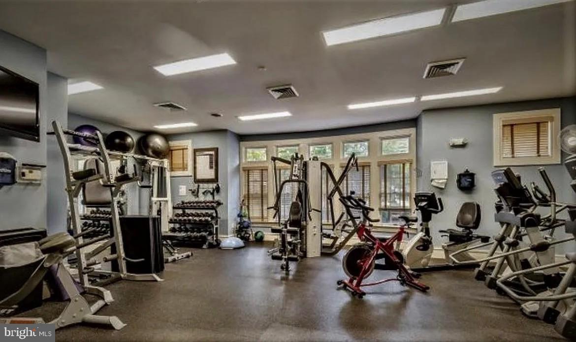 12185 Abington Hall Place, Unit 201 Reston, VA 20190 - Photo 26 of 32 a view of a room with gym equipment