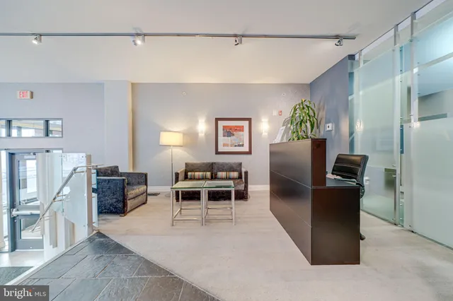 a living room with furniture and a couch