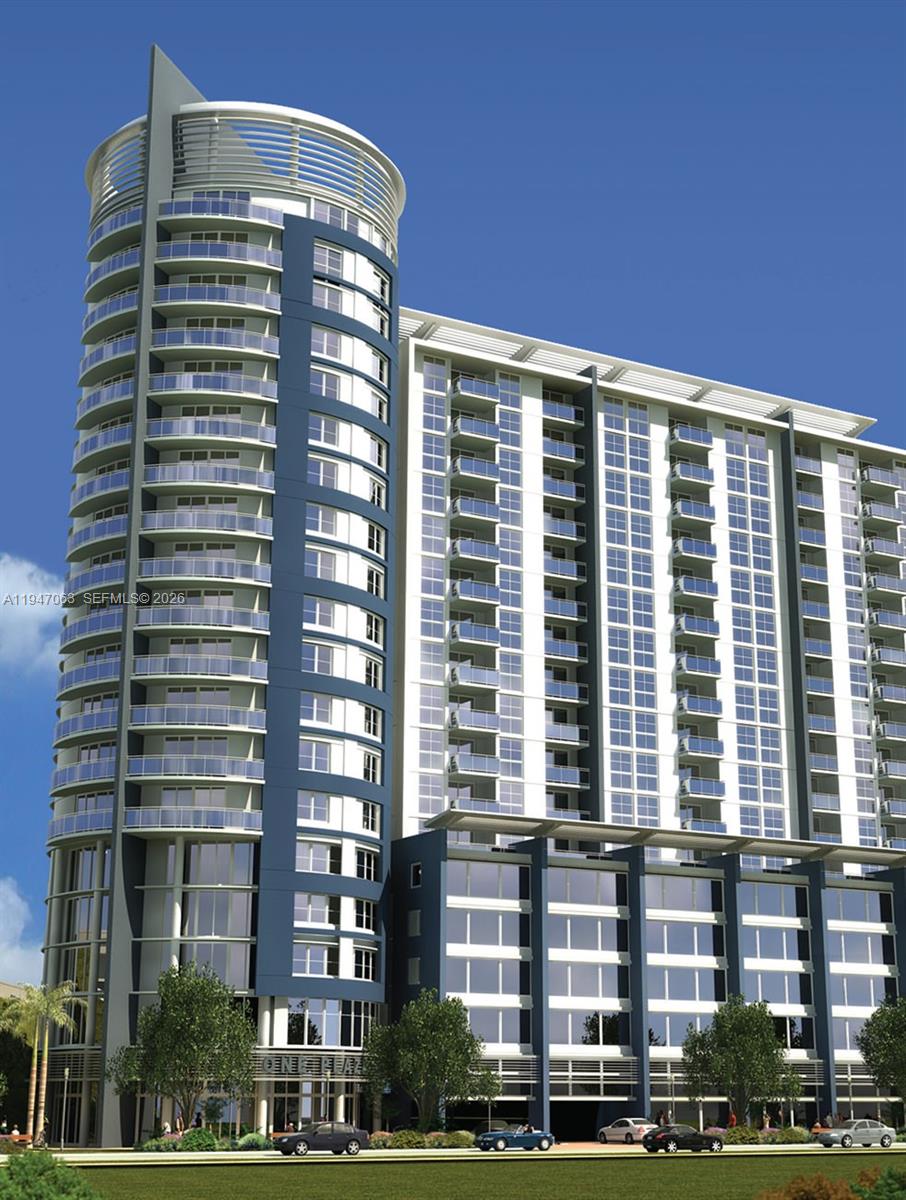 1818 Southwest 1st Avenue, Unit 1903 Miami, FL 33129 - Photo 1 of 1 a front view of a building with glass windows