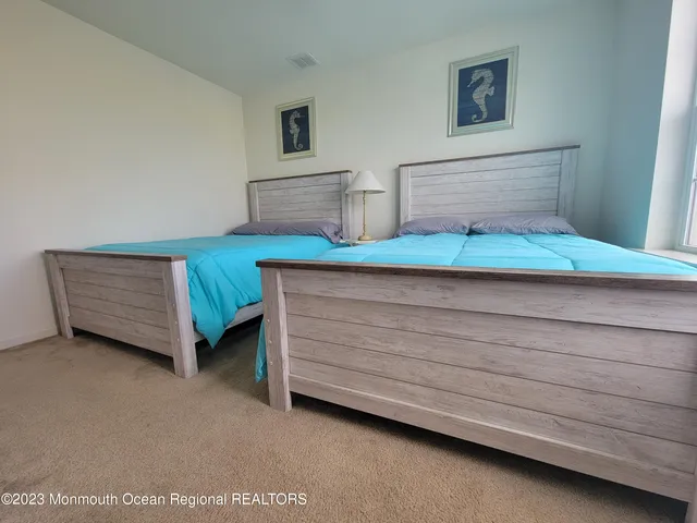 a view of room with furniture and cabinet