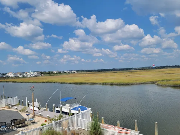 a view of a terrace with lake view and mountain view
