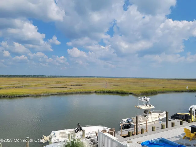 a view of a lake from a balcony