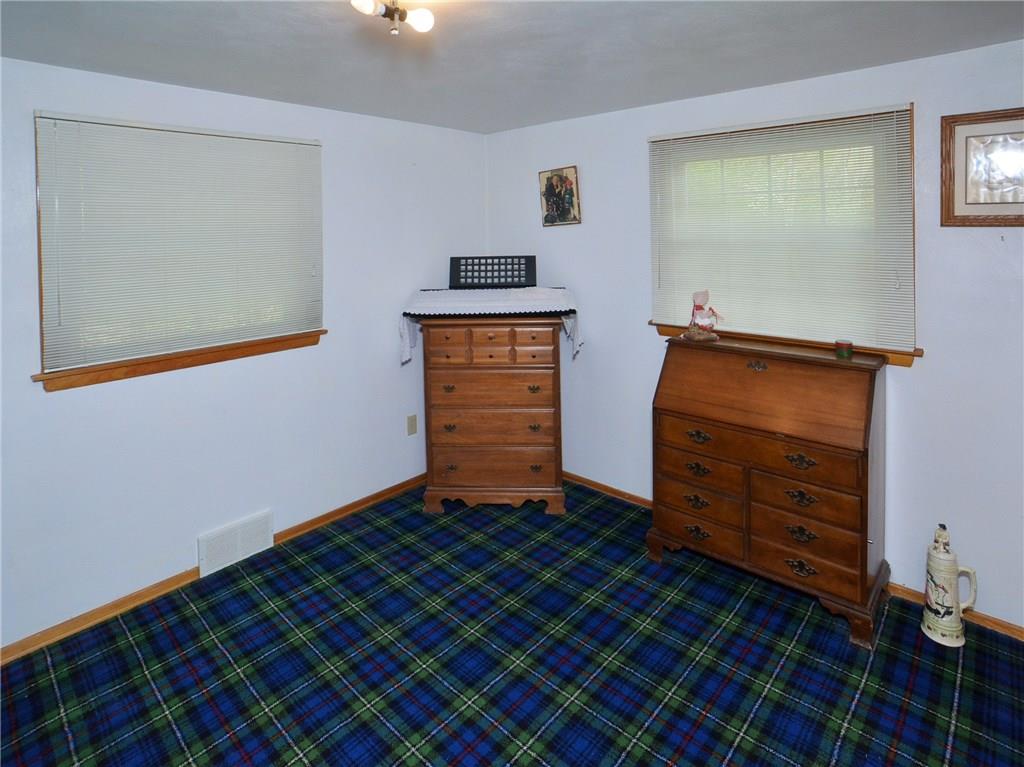 451 Utopia Apollo, PA 15613 - Photo 13 of 25 Beautiful Hardwood Floors under ALL carpeting throughout the home. This carpet is an oversized area rug