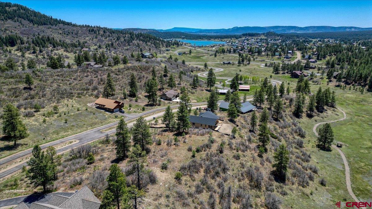 486-504 Santino Place Pagosa Springs, CO 81147 - Photo 1 of 15 a view of a city with mountains in the background
