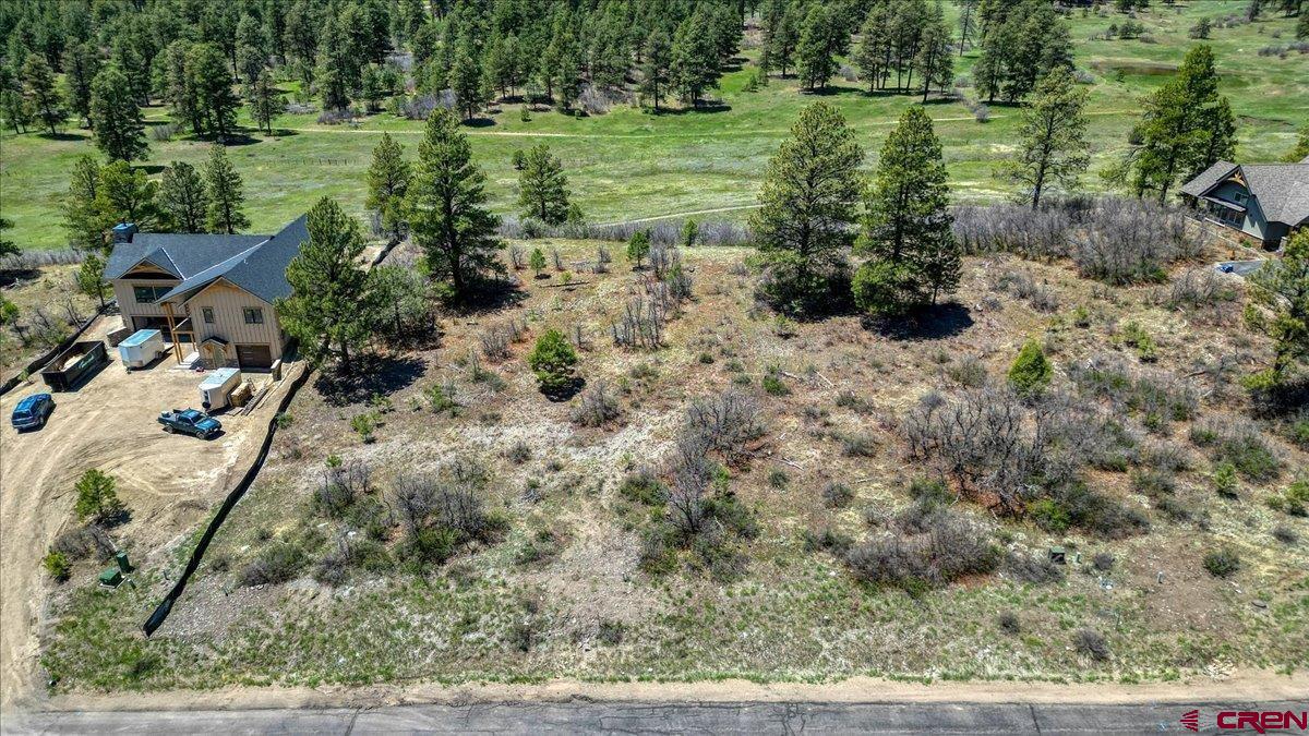 486-504 Santino Place Pagosa Springs, CO 81147 - Photo 14 of 15 a view of a garden with a bench
