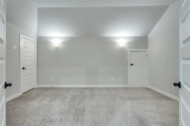 an empty room with a bathroom