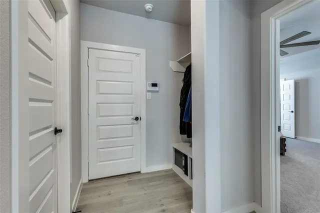 a bathroom with a double vanity sink and mirror