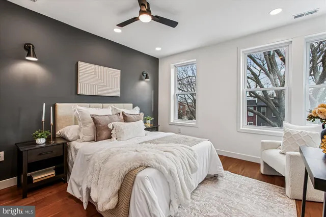 a bedroom with bed and a window