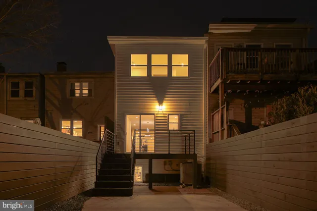 a view of a building with sitting area