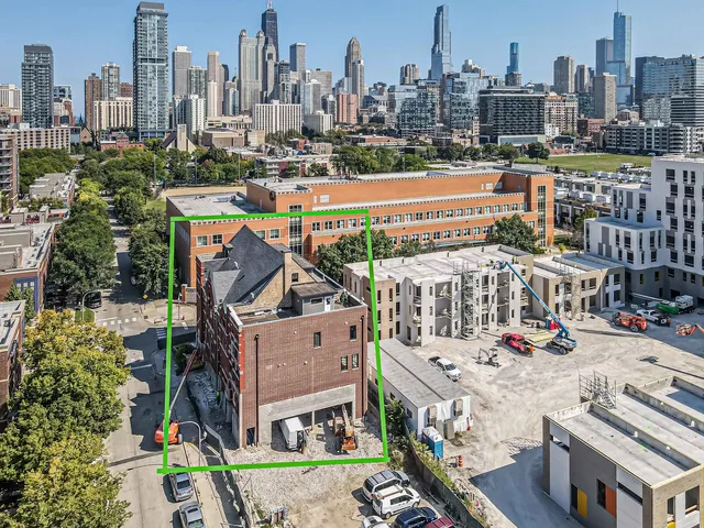 a view of a city with tall buildings