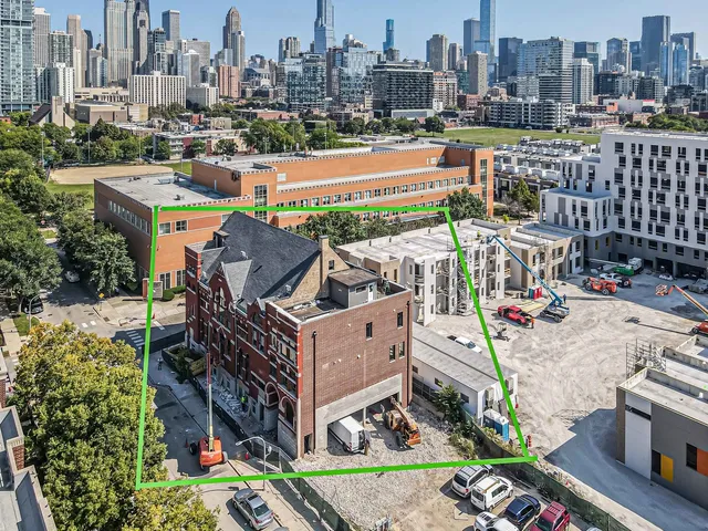 a view of a city with tall buildings