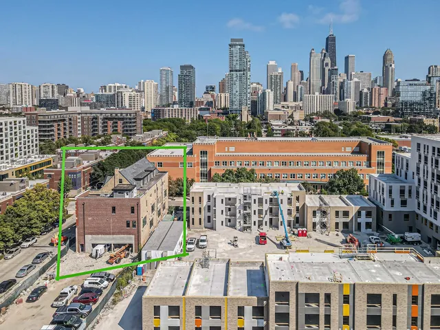 a view of city with tall buildings