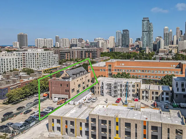 a view of a city with tall buildings