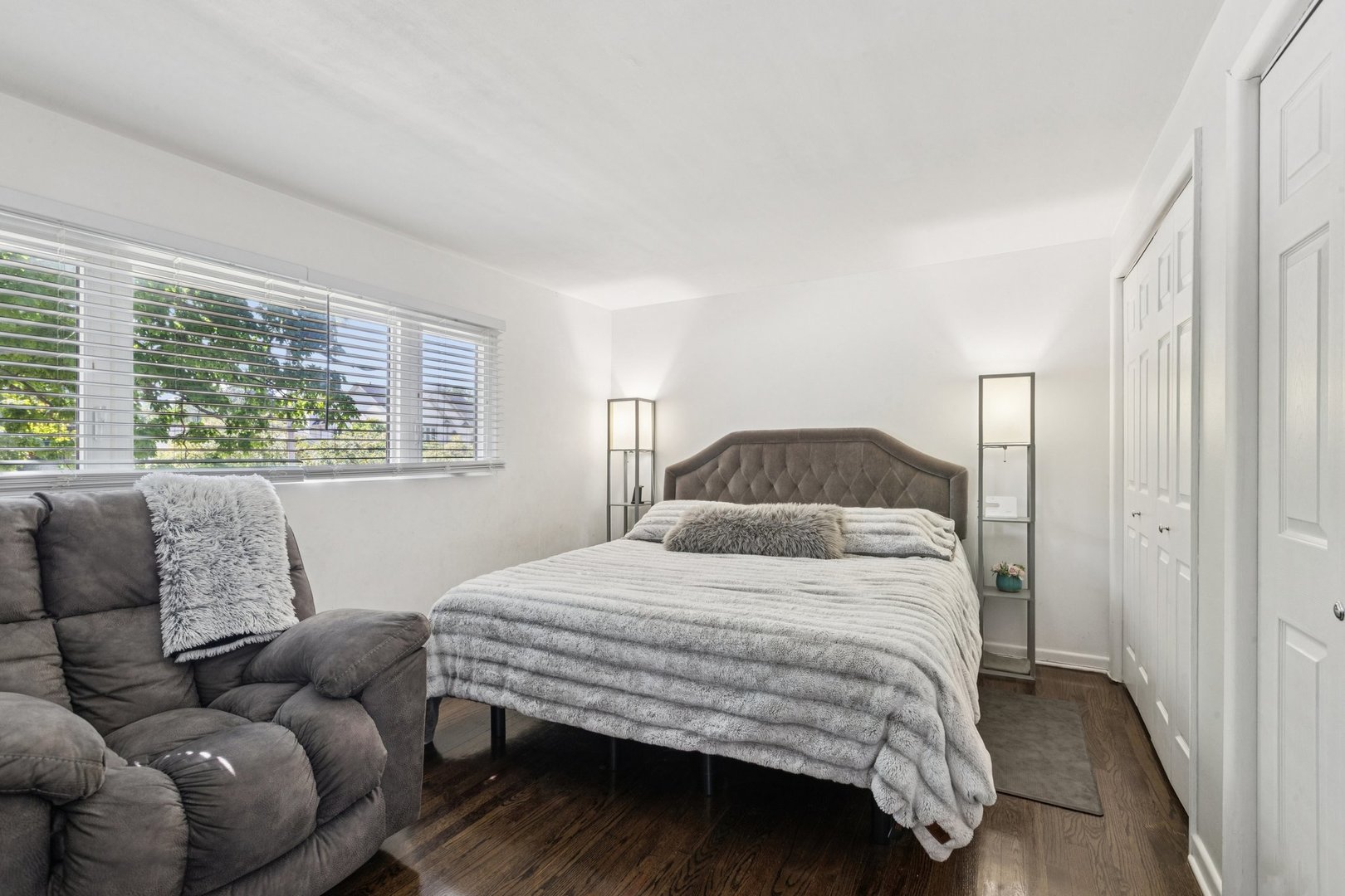 122 West Helen Road Palatine, IL 60067 - Photo 21 of 58 a bedroom with a bed couch and window
