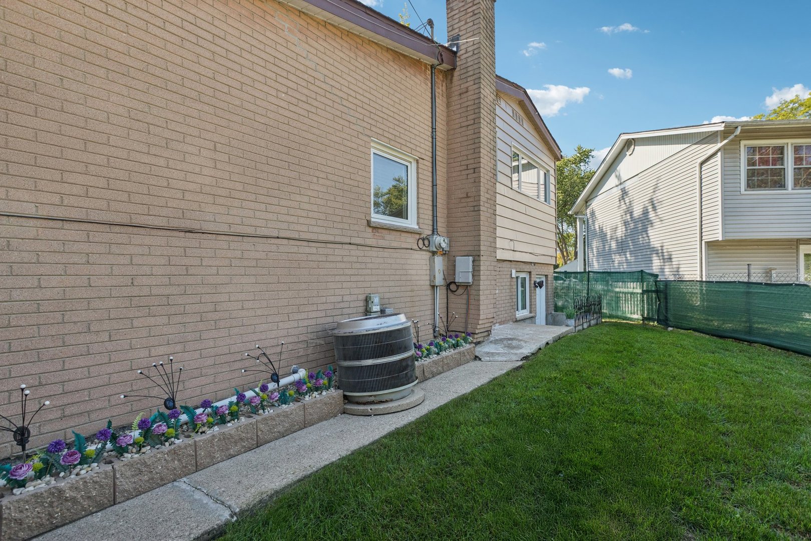 122 West Helen Road Palatine, IL 60067 - Photo 33 of 58 a view of a house with a backyard