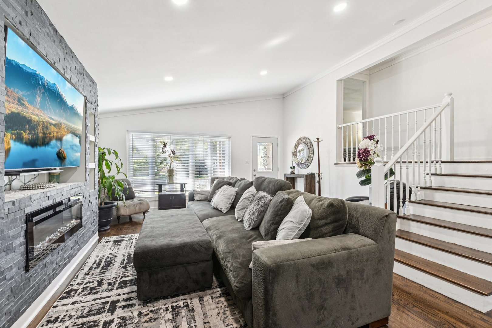 122 West Helen Road Palatine, IL 60067 - Photo 4 of 58 a living room with furniture fireplace and flat screen tv