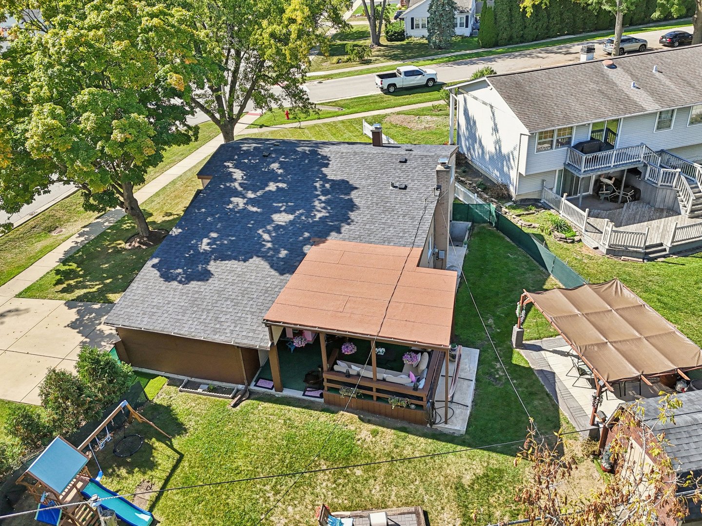 122 West Helen Road Palatine, IL 60067 - Photo 52 of 58 an aerial view of a house with garden space and street view