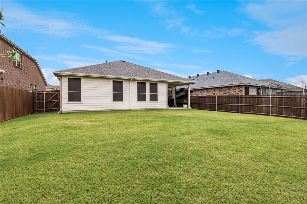 155 Texasage Street Rhome, TX 76078 - Photo 27 of 31 View of back of property