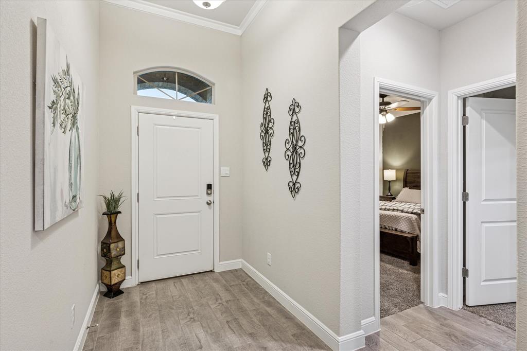 155 Texasage Street Rhome, TX 76078 - Photo 5 of 31 Beautiful entry into the home