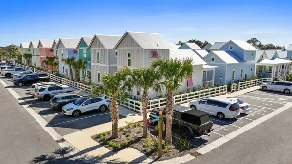 an aerial view of a house with outdoor space