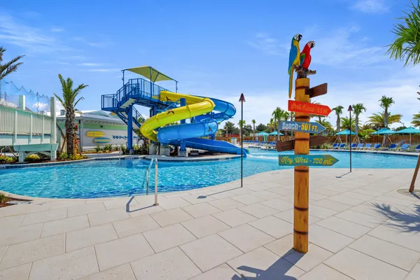 a view of a swimming pool with a slide