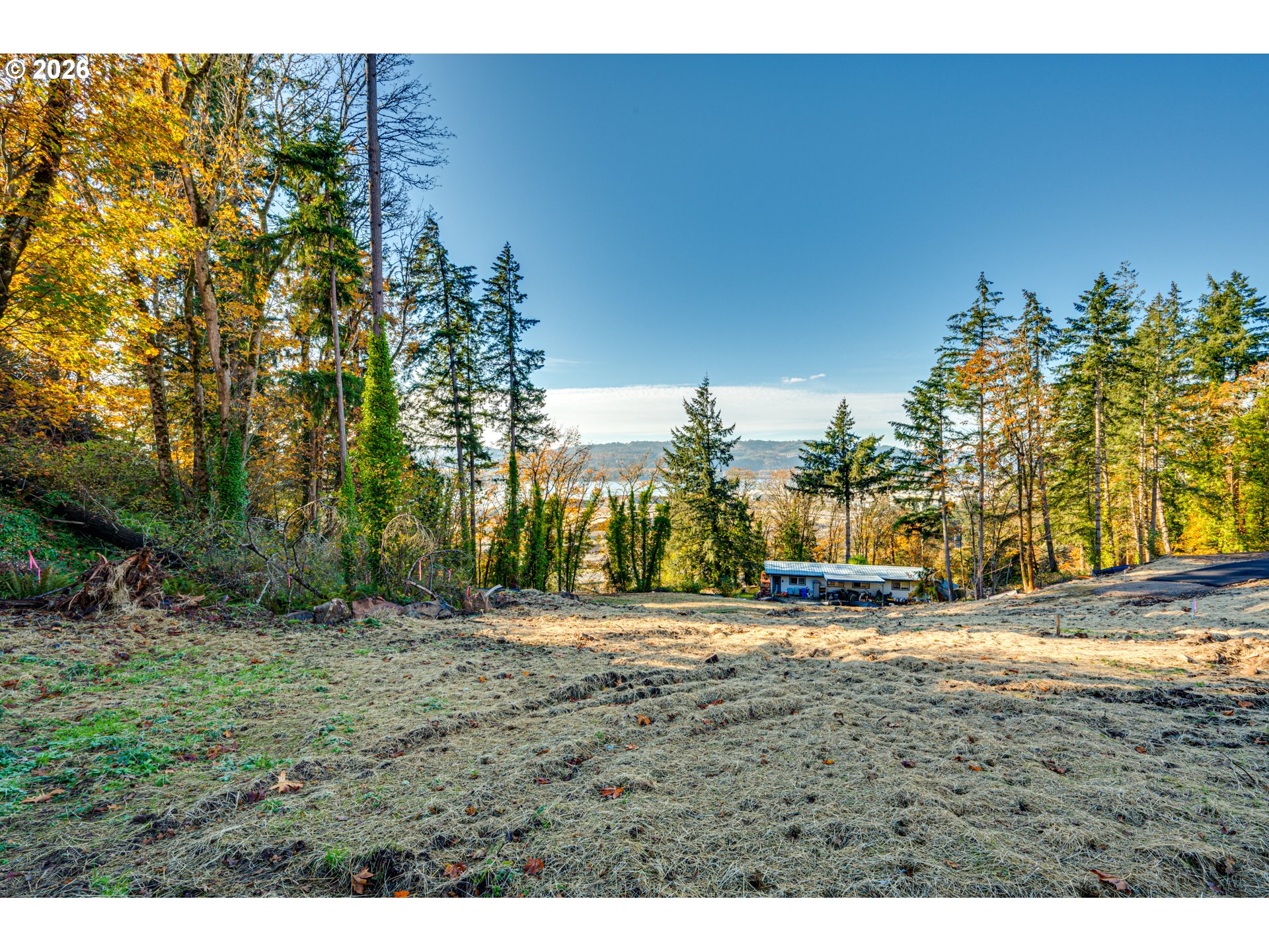 Spencer Creek Road Kalama, WA 98625 - Photo 10 of 23 a view of a road with a building in the background