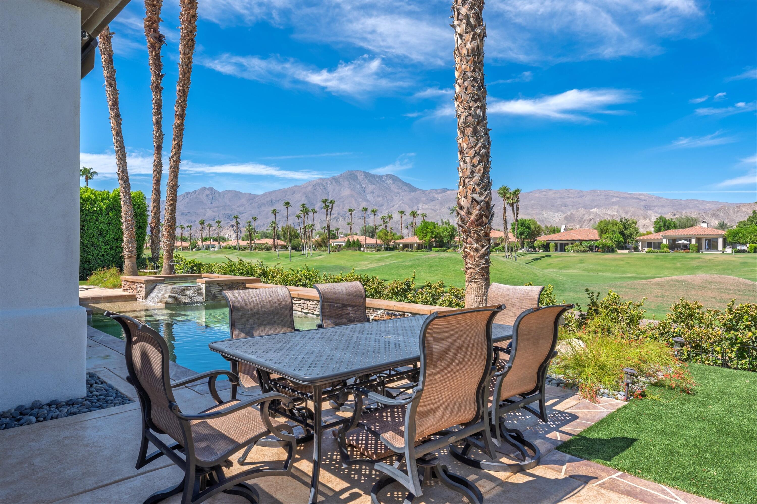 56023 Winged Foot La Quinta, CA 92253 - Photo 7 of 44 a view of a patio with table and chairs and plants