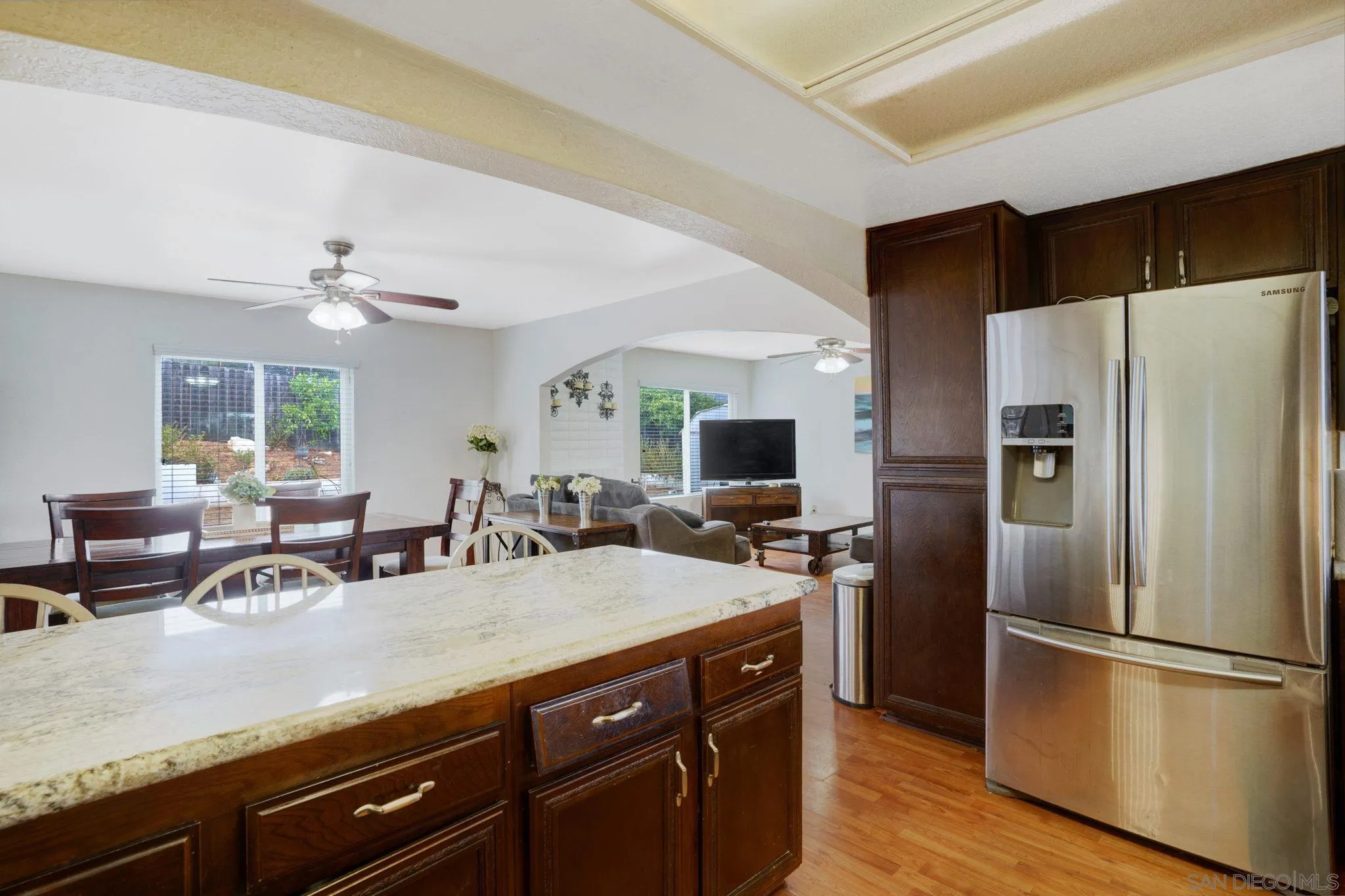 1082 Fulton Road San Marcos, CA 92069 - Photo 14 of 38 a kitchen with a refrigerator and a sink