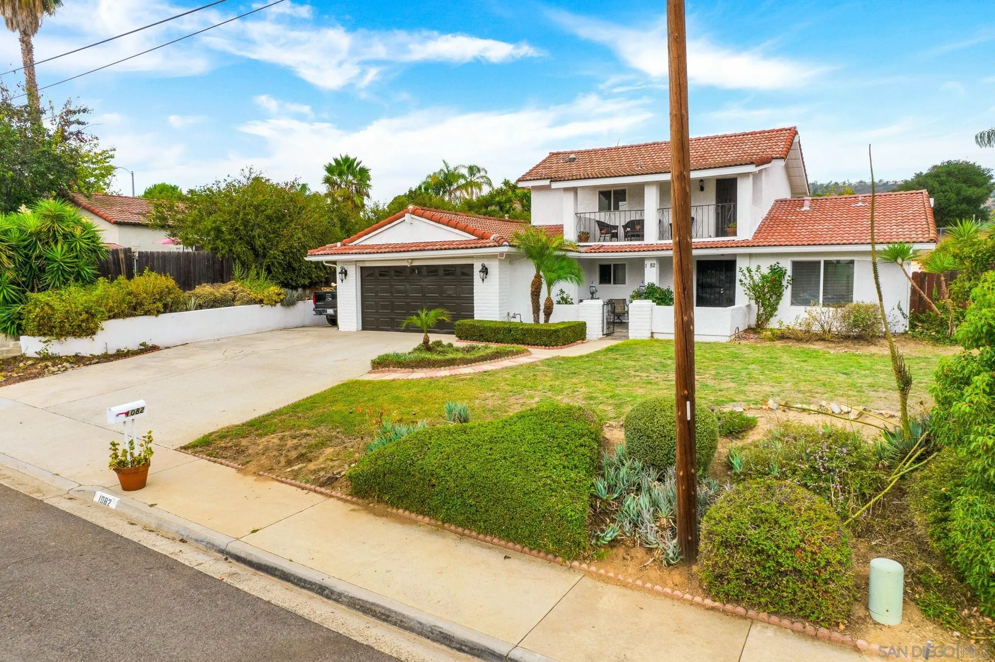 1082 Fulton Road San Marcos, CA 92069 - Photo 2 of 38 a front view of a house with yard