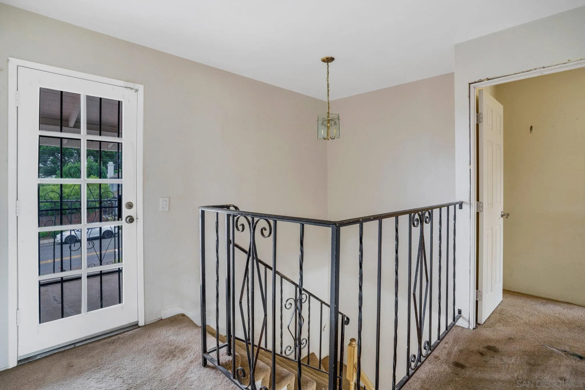 1082 Fulton Road San Marcos, CA 92069 - Photo 21 of 38 a view of a hallway with wooden floor and entryway