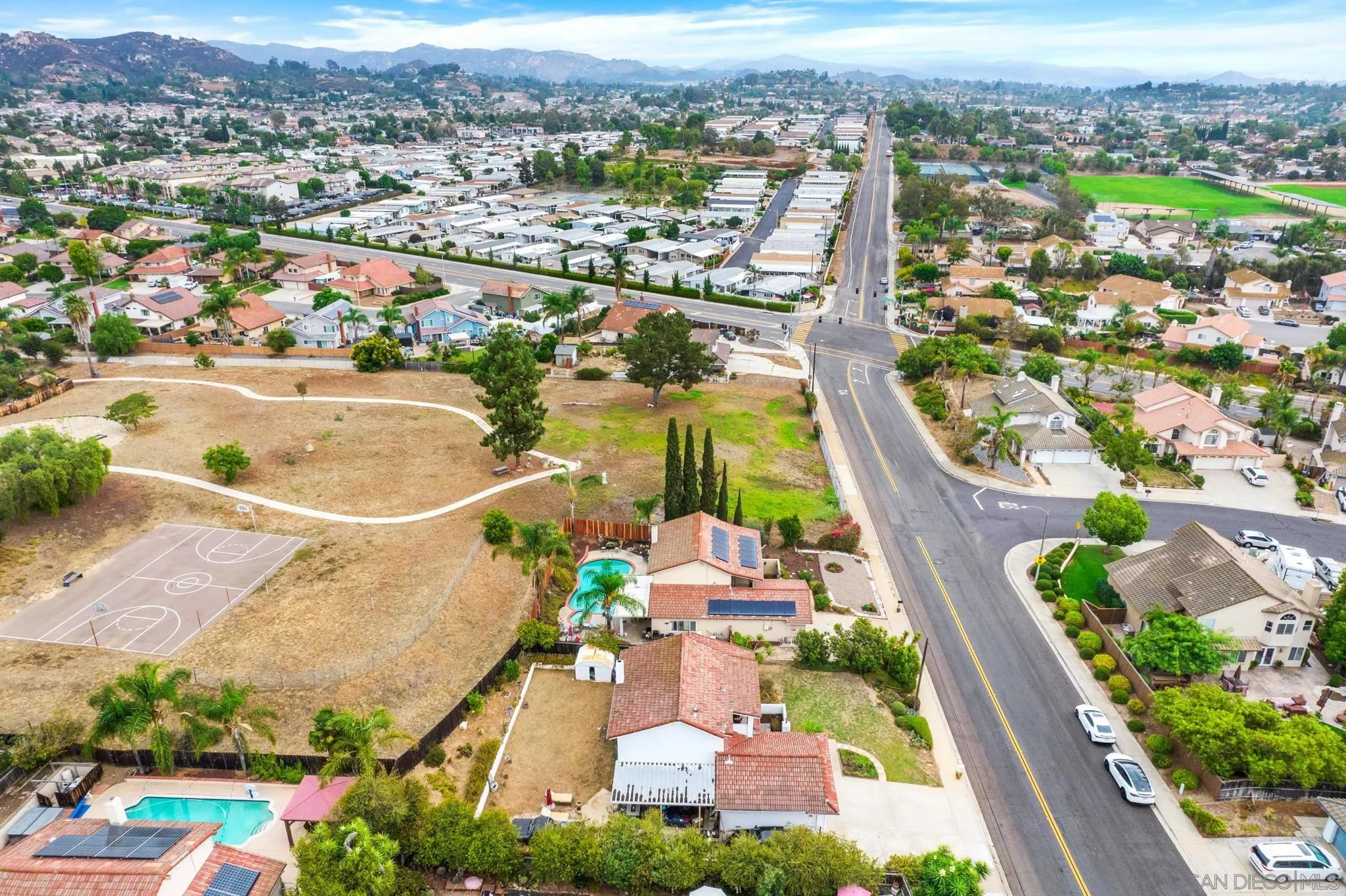 1082 Fulton Road San Marcos, CA 92069 - Photo 6 of 38 an aerial view of residential houses with outdoor space and swimming pool
