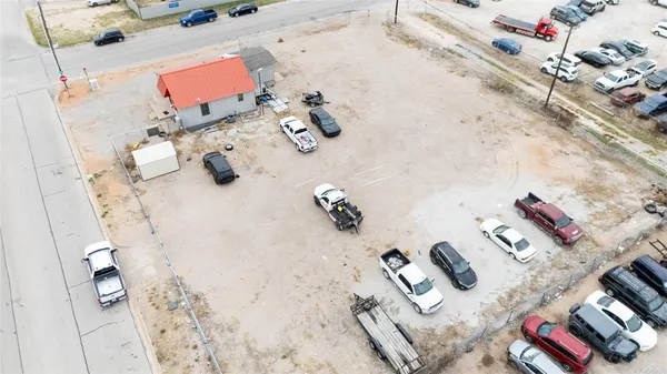 a bathroom with a bathtub sink and mirror