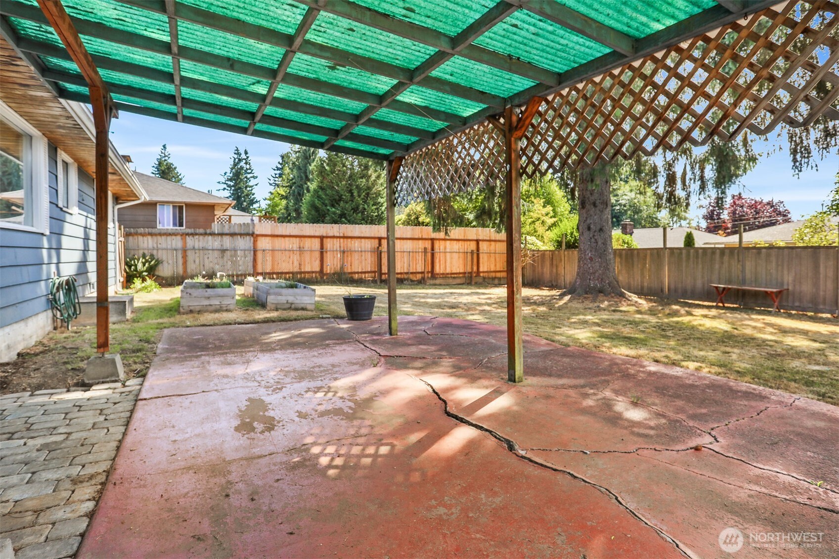 5626 Beverly Lane Everett, WA 98203 - Photo 33 of 38 a backyard of a house with a shaded area
