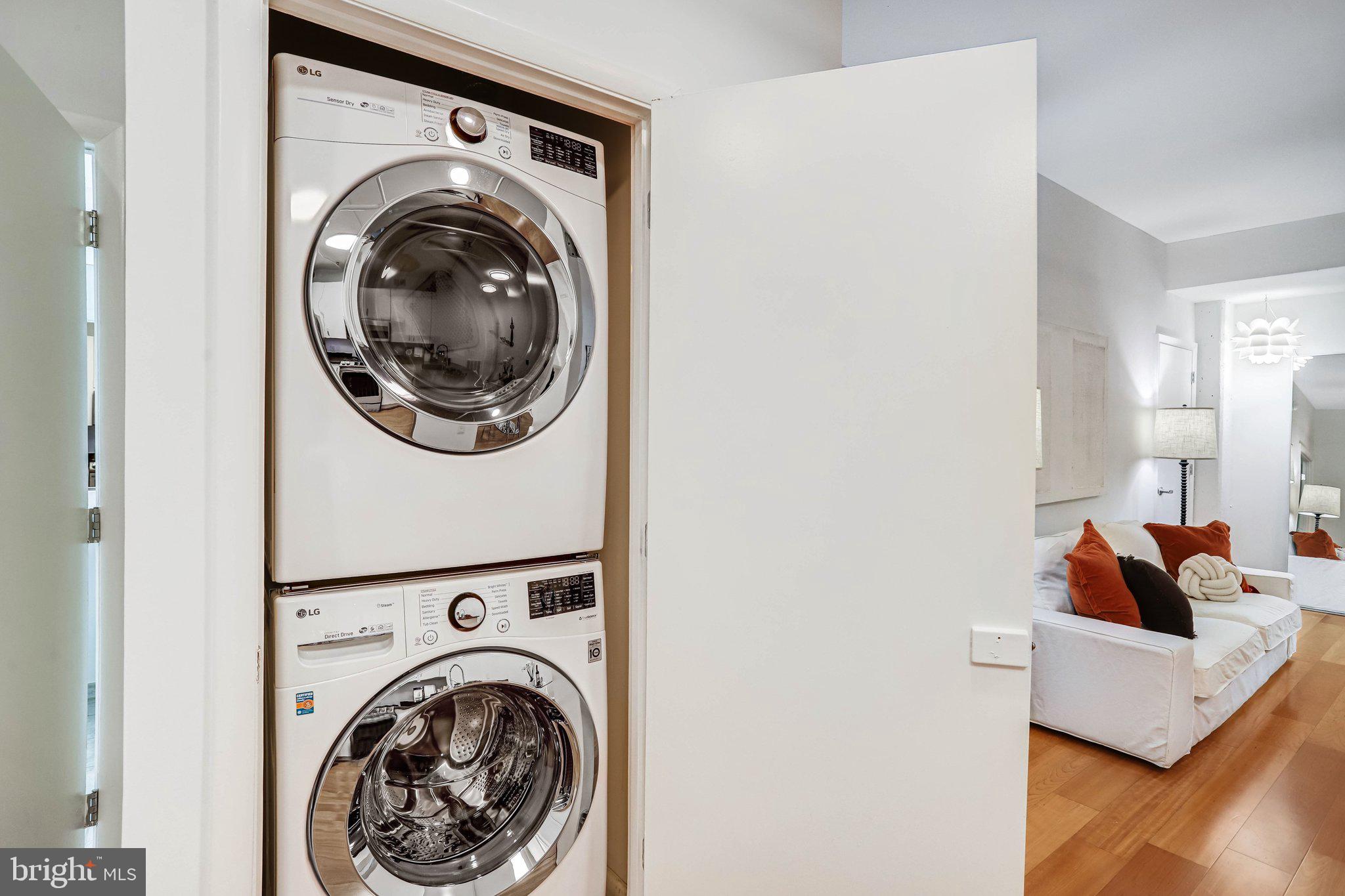 1300 N Street Northwest, Unit 15 Washington, DC 20005 - Photo 25 of 51 a view of a living room with washer and dryer