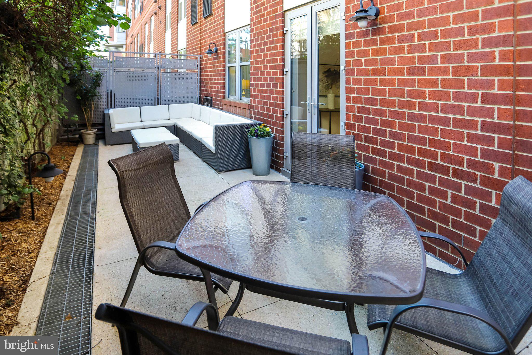 1300 N Street Northwest, Unit 15 Washington, DC 20005 - Photo 31 of 51 a view of balcony patio and outdoor seating