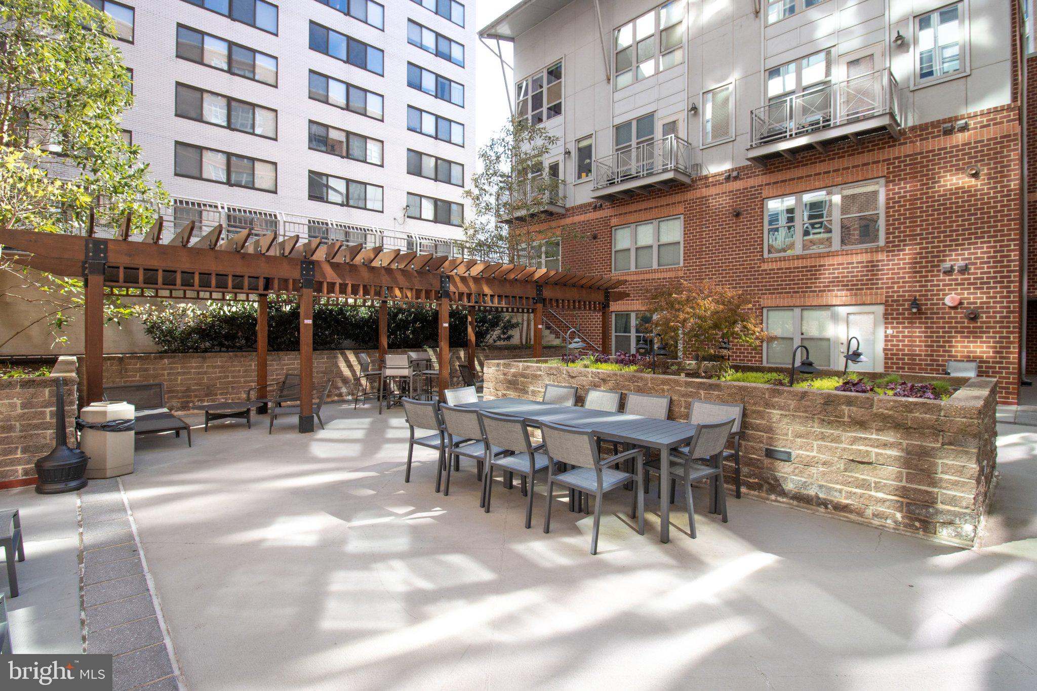 1300 N Street Northwest, Unit 15 Washington, DC 20005 - Photo 38 of 51 a view of a building with sitting area