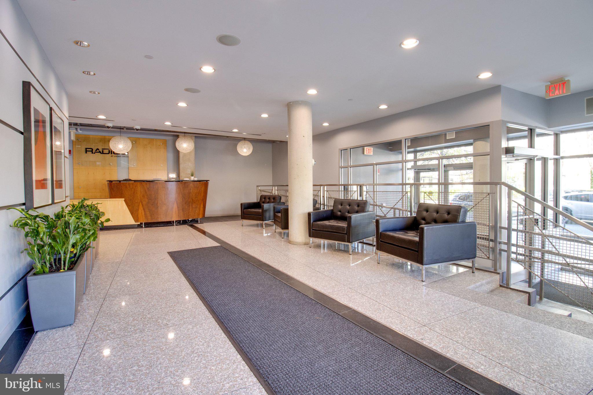 1300 N Street Northwest, Unit 15 Washington, DC 20005 - Photo 46 of 51 a lobby with furniture and a potted plant