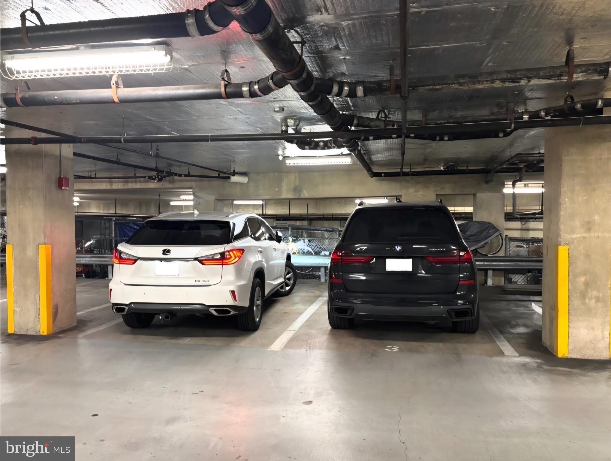 1300 N Street Northwest, Unit 15 Washington, DC 20005 - Photo 47 of 51 a view of parking garage with cars parked