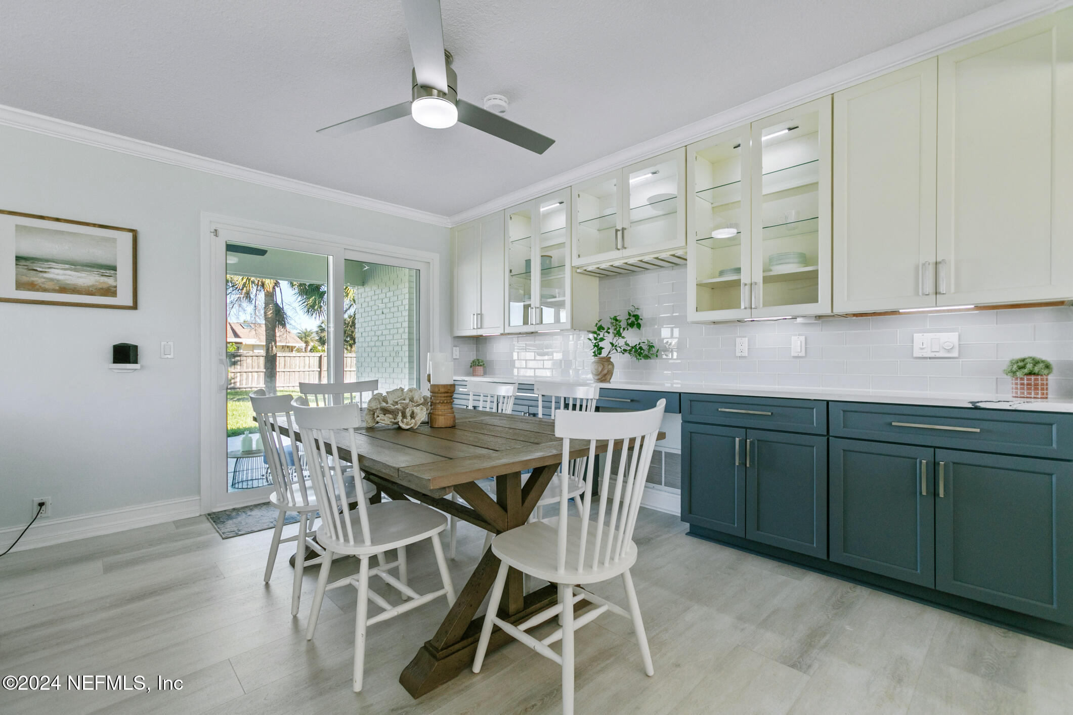 47 Sandpiper Drive St. Augustine, FL 32080 - Photo 20 of 61 a view of a dining room with furniture and wooden floor