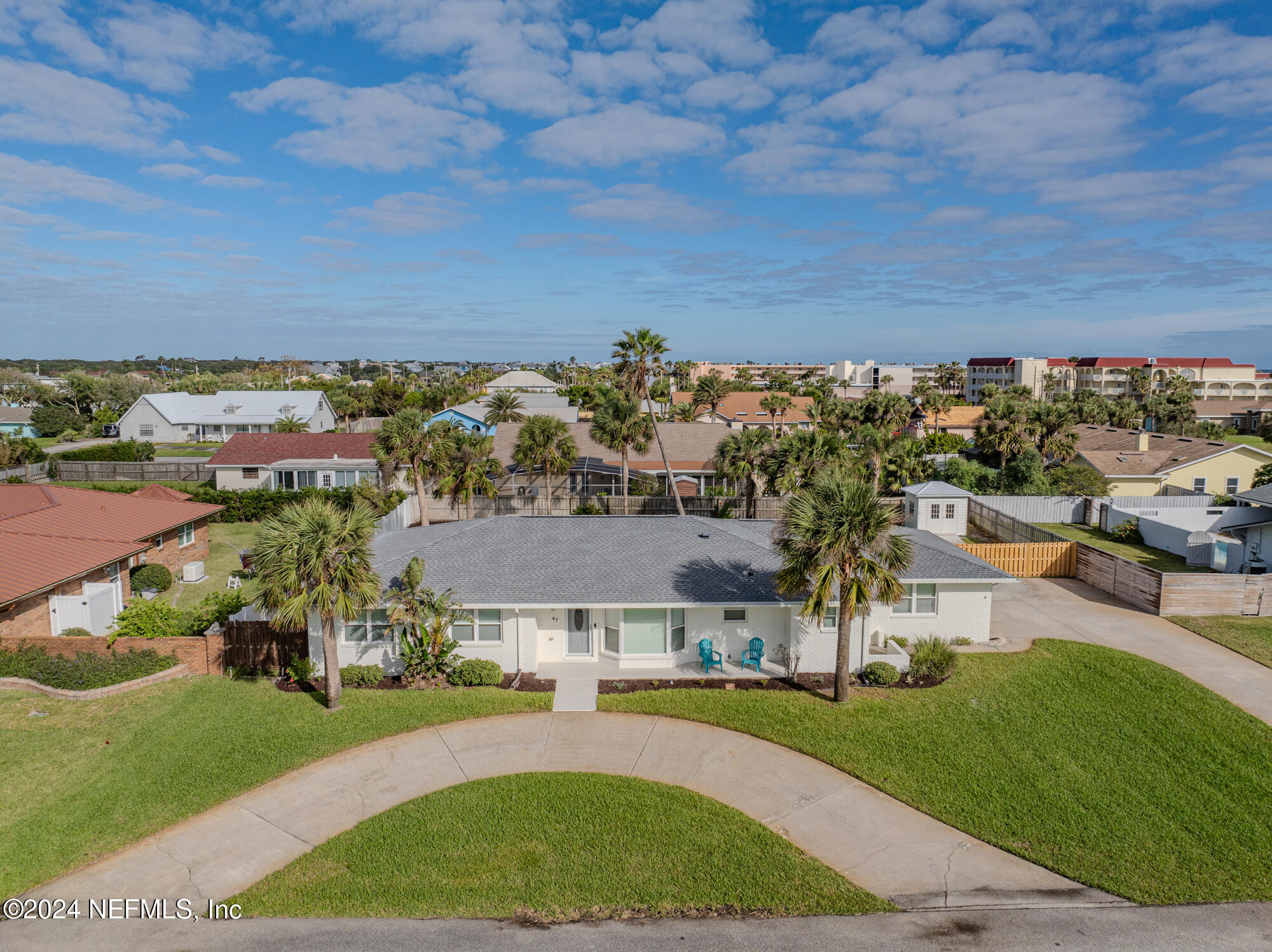 47 Sandpiper Drive St. Augustine, FL 32080 - Photo 2 of 61 an aerial view of a house with a garden and lake view