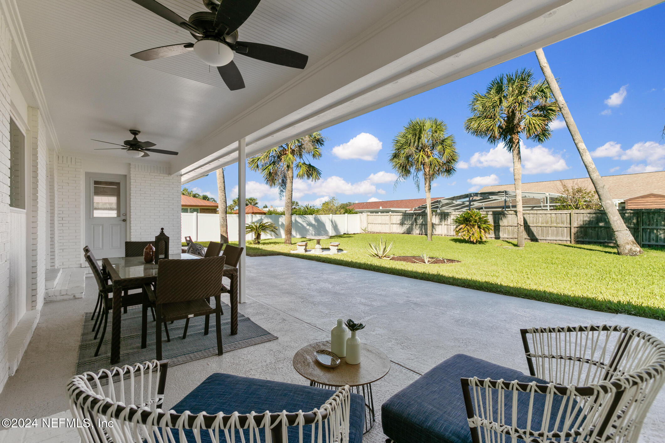 47 Sandpiper Drive St. Augustine, FL 32080 - Photo 21 of 61 a view of a dining room with furniture and chandelier