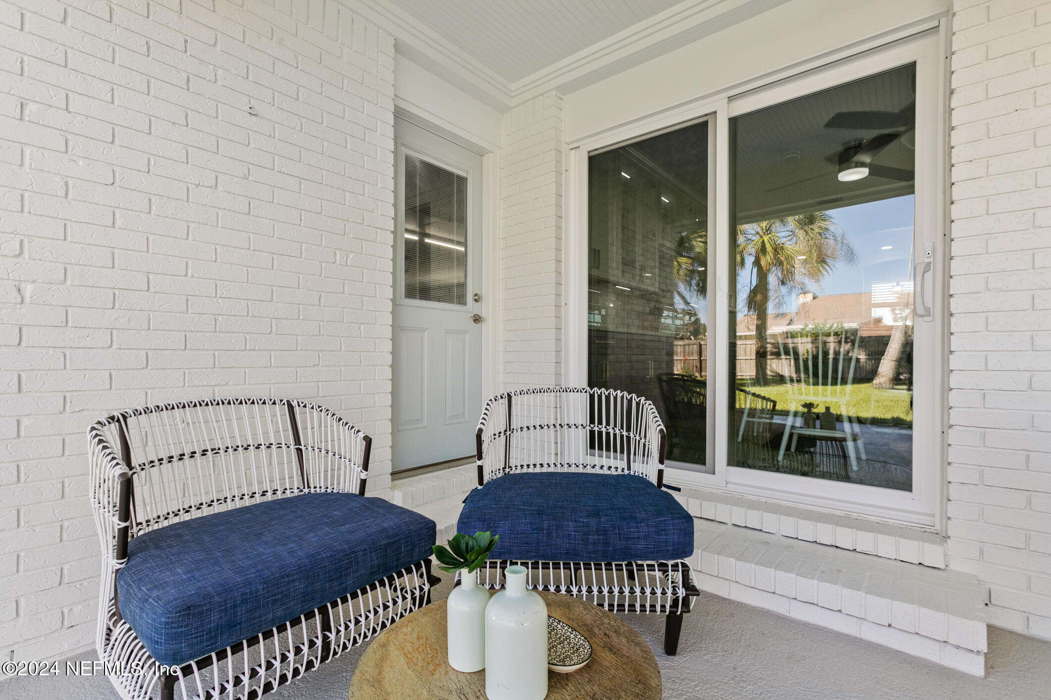 47 Sandpiper Drive St. Augustine, FL 32080 - Photo 22 of 61 a living room with a couch and a table