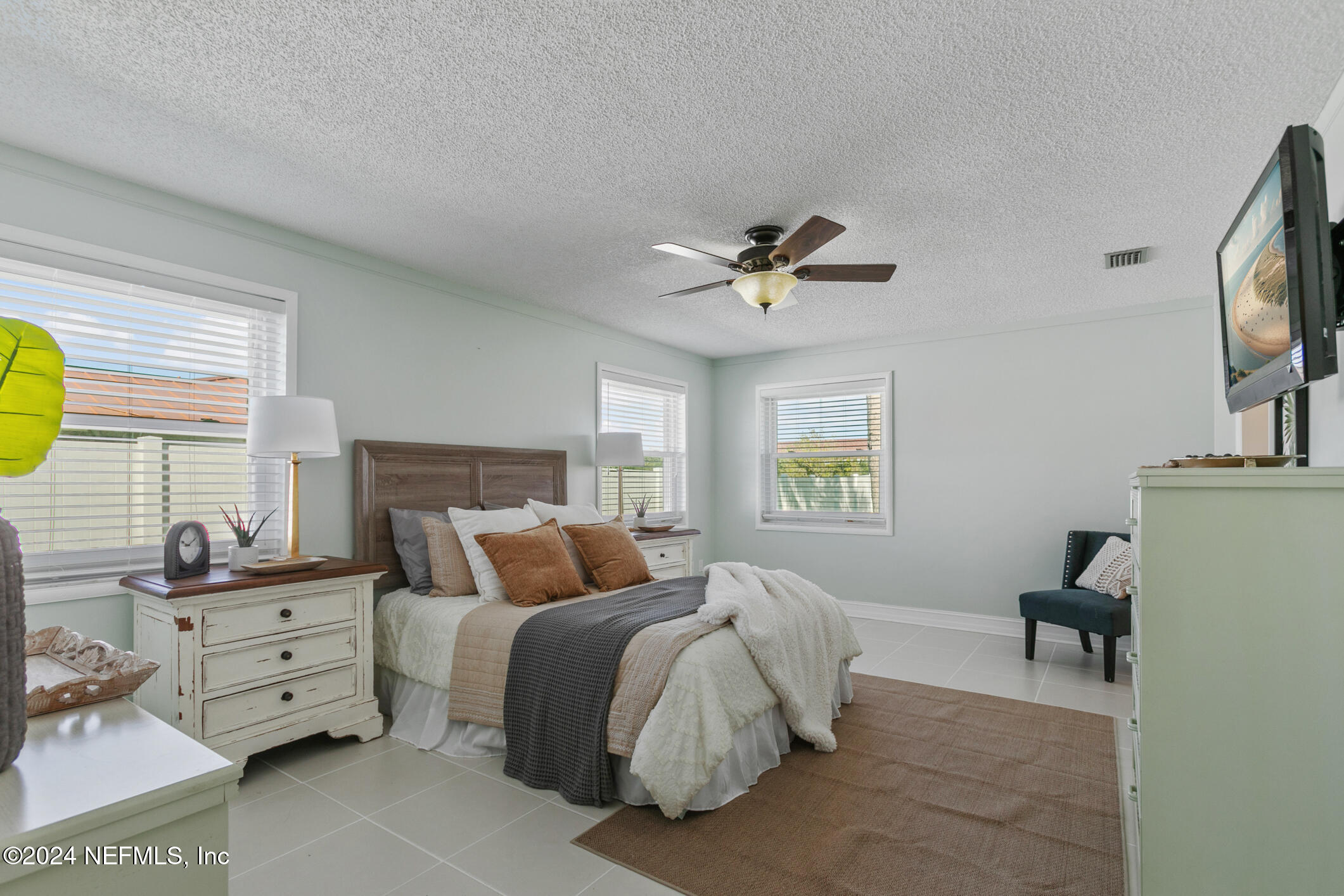 47 Sandpiper Drive St. Augustine, FL 32080 - Photo 30 of 61 a bedroom with a bed and furniture
