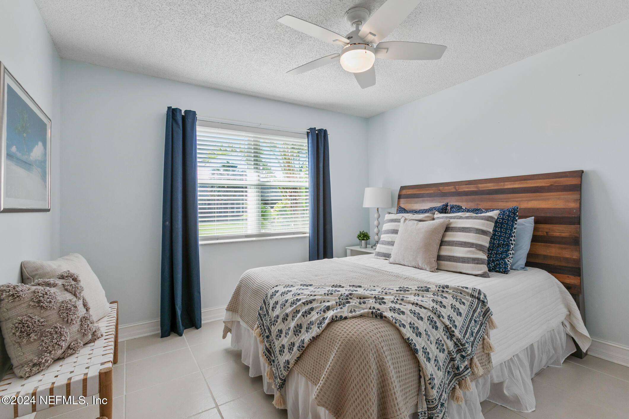 47 Sandpiper Drive St. Augustine, FL 32080 - Photo 35 of 61 a bedroom with a large bed and a window