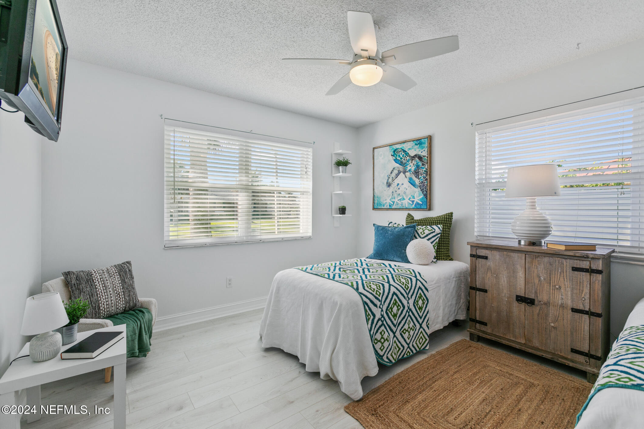 47 Sandpiper Drive St. Augustine, FL 32080 - Photo 38 of 61 a bedroom with a bed and furniture