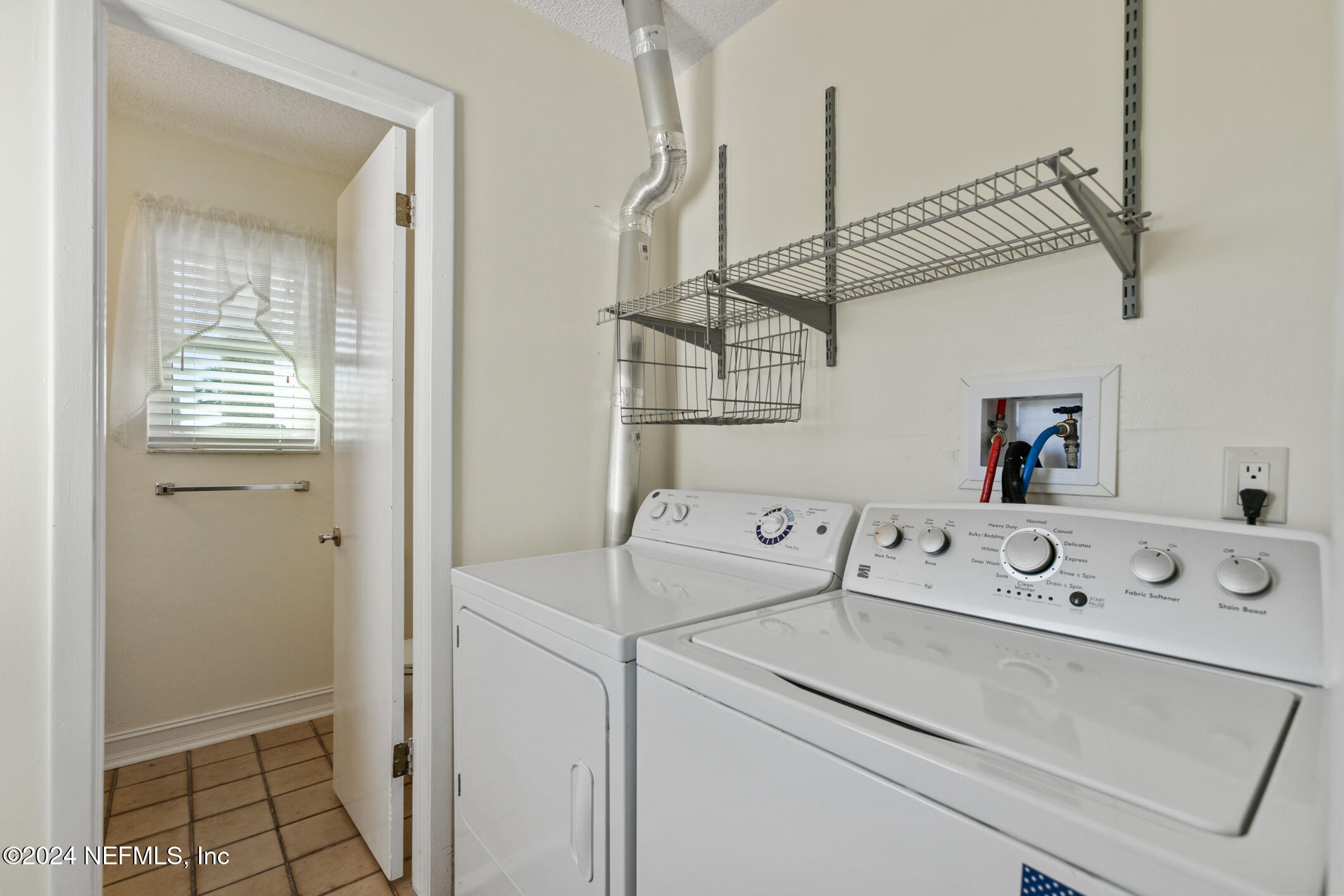 47 Sandpiper Drive St. Augustine, FL 32080 - Photo 41 of 61 a utility room with dryer and washer